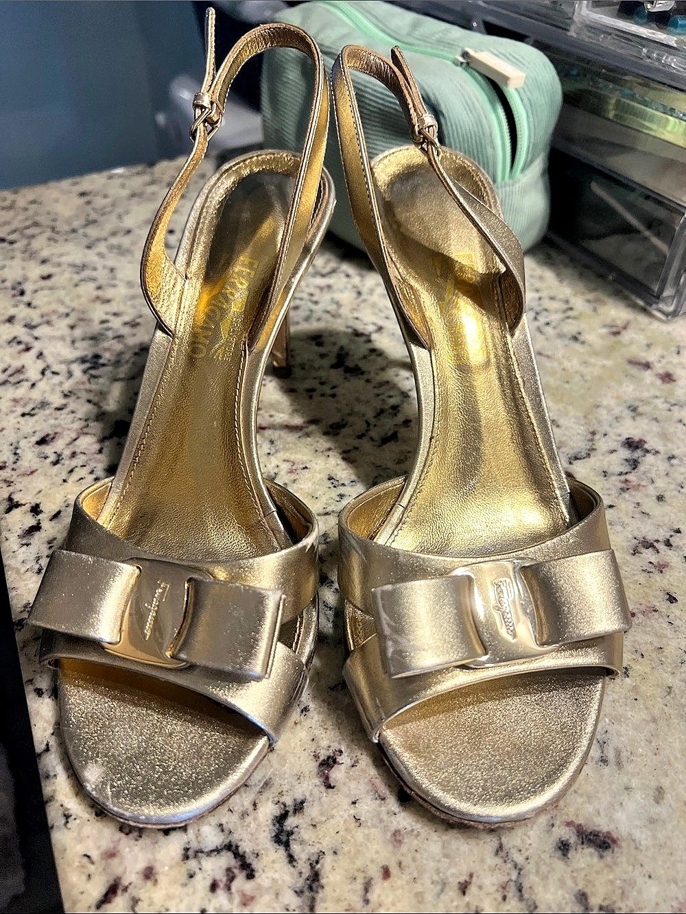 Salvatore Ferragamo Vara Bow Slingback Heel Metallic Bow Heels in Gold